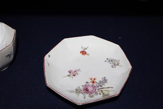 A Chelsea red anchor period octagonal tea bowl and saucer, c.1756,